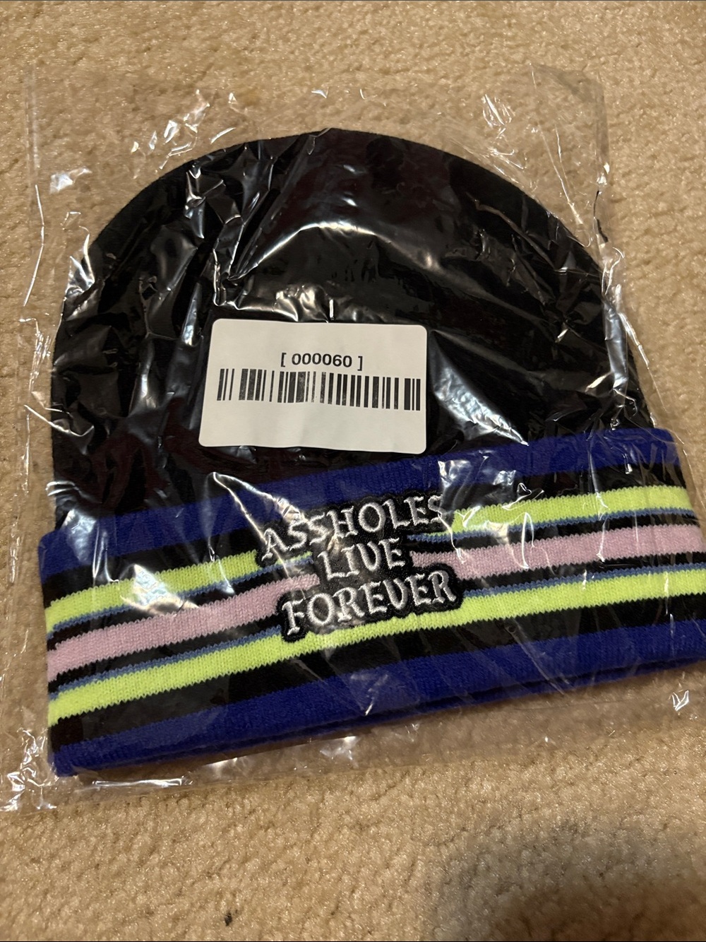 Black Knit Beanie with Multicolor Striped Cuff and Embroidered Slogan